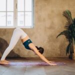 woman in downward dog pose